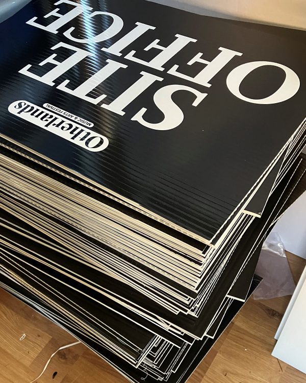 Stack of Correx printed sign